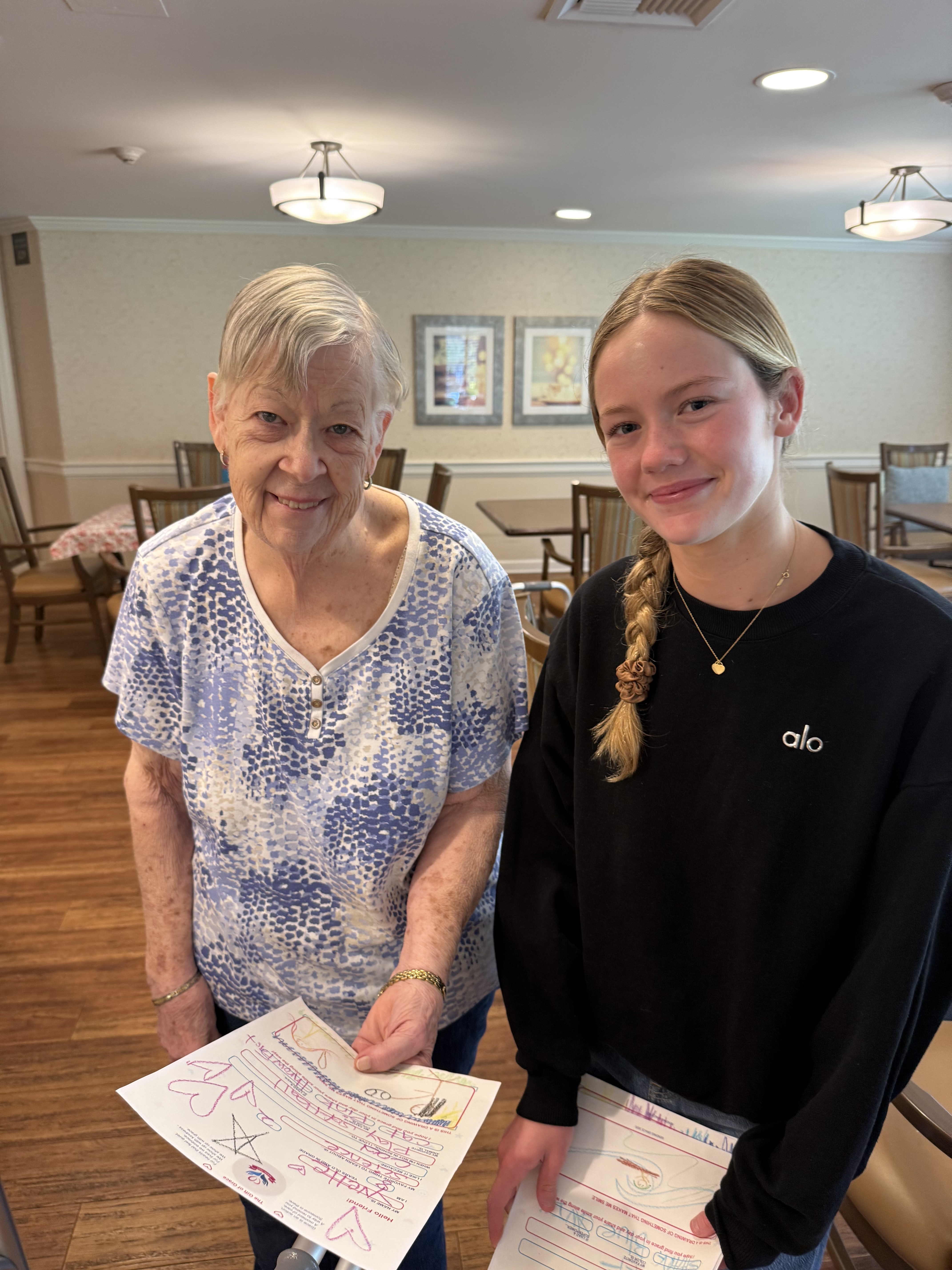 A resident reading her Sending Grace letter